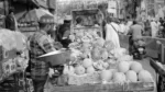 Man Selling Fruits in a Local Market - Log, colour and B&W - Image 2