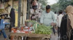 Man Selling Vegetables in a Street Market - Log, colour and B&W