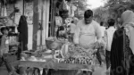 Man Selling Vegetables in a Street Market - Log, colour and B&W - Image 2