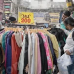 Selling Clothes on Street - Log, colour and B&W