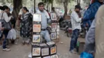 Man Selling Photo Frames - Log, colour and B&W