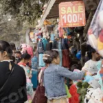 Women Buying Toys - Log colour and B&W