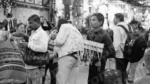 Boy Selling Locket & Necklace - Log, colour and B&W - Image 2
