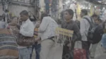 Boy Selling Locket & Necklace - Log, colour and B&W - Image 3