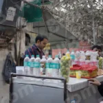 Man Selling Lemon Juice - Log, colour and B&W