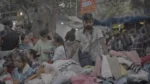 Selling Clothes in a Market - Log, colour and B&W - Image 3