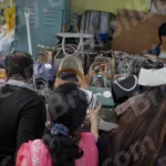 People Buying Handbags in a Market - Log, colour and B&W