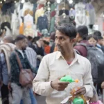 Man Selling Bubbles Making Machine - Log, colour and B&W