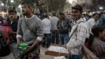 Man Selling Necklace in a Market - Log, colour and B&W
