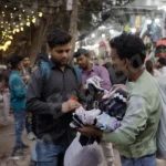 Man Selling Socks - Log, colour and B&W