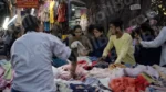 People Buying Clothes in a Market - Log, colour and B&W