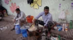 Man Making Tea in a Street - Log, colour and B&W
