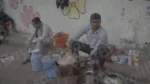Man Making Tea in a Street - Log, colour and B&W - Image 3