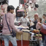 Girl's Buying Toys in a Shop - Log, colour and B&W