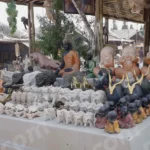 A Collection of Handcrafted Statues - Log, colour and B&W