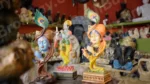 Hindu God Statue in a Shop - Log, colour and B&W