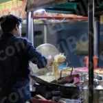 Man Making Chowmin - Log, colour and B&W