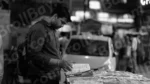 Man Reading Books in a Book Stall - Log, colour and B&W - Image 2