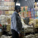 Goods Stall in a Street Market - Log, colour and B&W