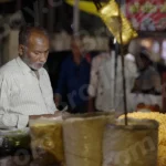 Man Selling Namkeen Snacks - Log, colour and B&W