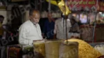 Man Selling Namkeen Snacks - Log, colour and B&W