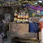 Selling Food Oil in a Street - Log, colour and B&W