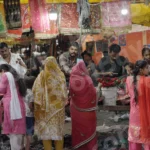 People Buying Religion Items in a Shop - Log, colour and B&W