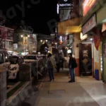 People are Standing And Walking in Sidewalk - Log, colour And B&W