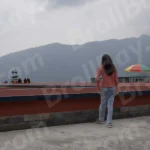 A Woman Walking Inside Monastery - Log, Colour and B&W