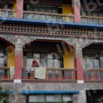 A Monk Walking in a Monastery - Log, colour and B&W