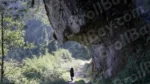 A Man Walking Through the Mountain Forest - Log, colour and B&W