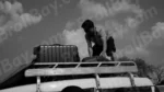 Man Putting Luggage on Top of a Car - Log, colour and B&W - Image 2