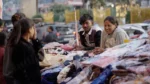 People Buying Clothes in a Roadside Market - Log, colour and B&W
