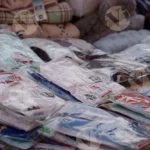 Clothes in a Roadside Shop - Log, colour and B&W