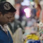 Man Selling Clothes - Log, colour and B&W