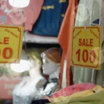 Sale Board in a Shop - Log, colour and B&W