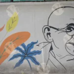 Mahatma Gandhi Art on a Wall - Log, colour and B&W