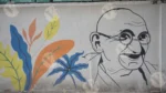 Mahatma Gandhi Art on a Wall - Log, colour and B&W