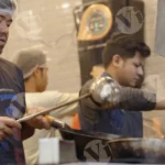 Cook Making Chowmin - Log, colour and B&W