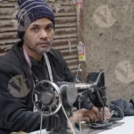 Tailor Sewing Clothes - Log , colour and B&W