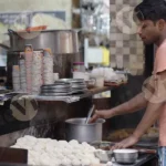 Boy Making Roti Bread - Log, colour and B&W