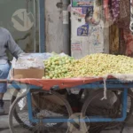 Man Selling Fruits - Log, colour and B&W