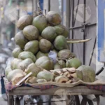 Coconut water in a Stall - Log, colour and B&W