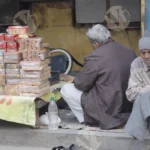 Old Man Selling Snacks - Log, colour and B&W