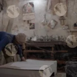 The Carpenter is Hammering Nails on the Plywood - Log, colour and B&W