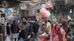 Man Selling Candy in a Market - Log, colour and B&W